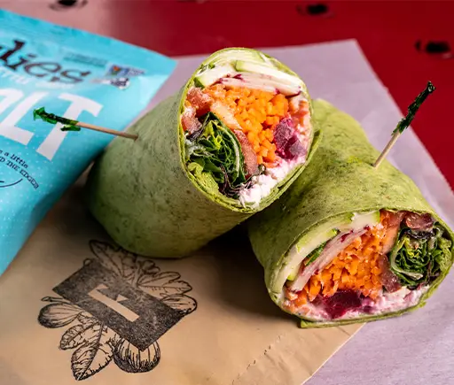 Colorful fresh vegetables in spinach wraps are some of the specialty foods, drinks and gifts available at Firestone's Market On Market